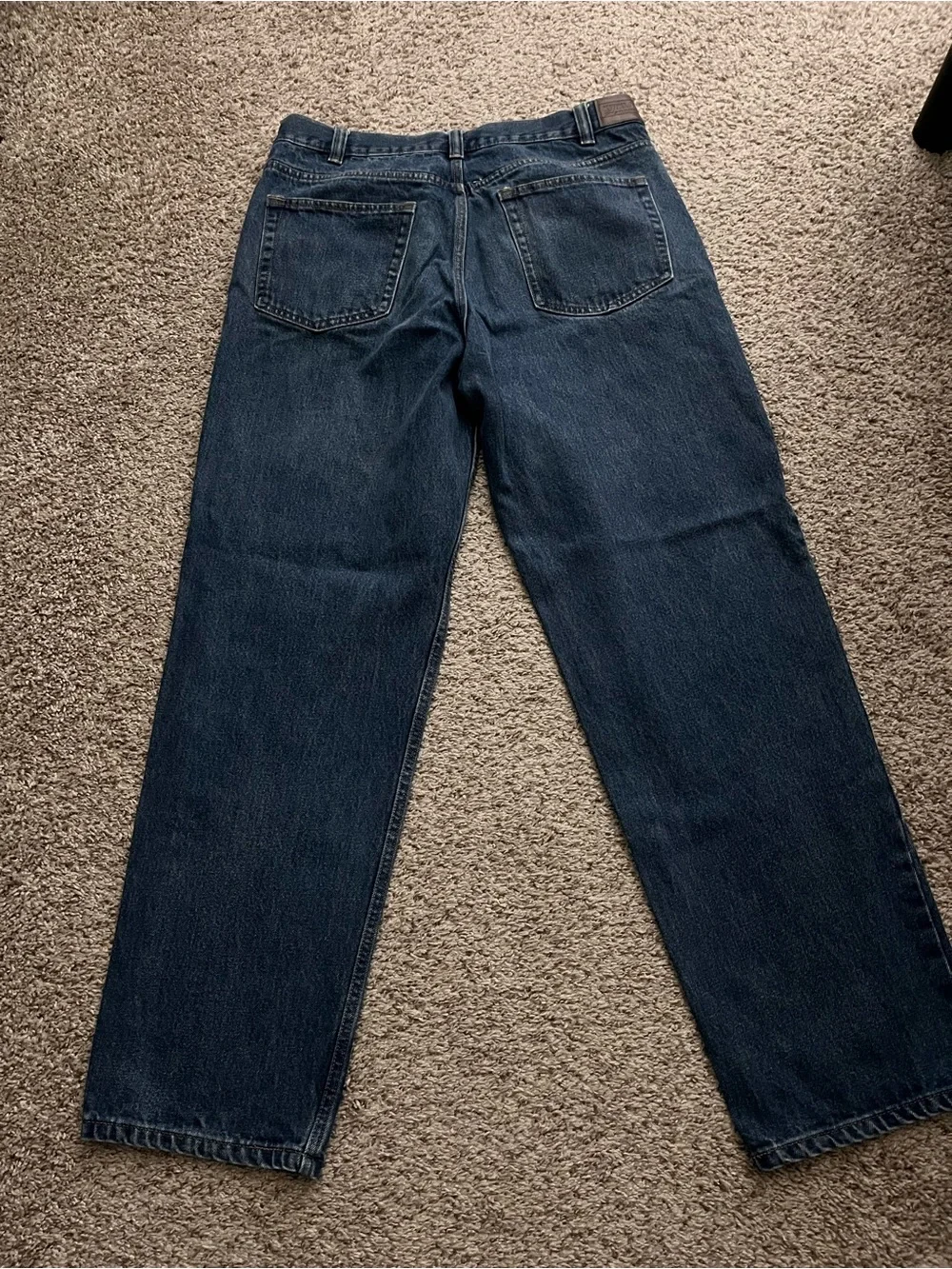 Kirkland Signature Men's Jeans in dark wash blue. Size 36-32